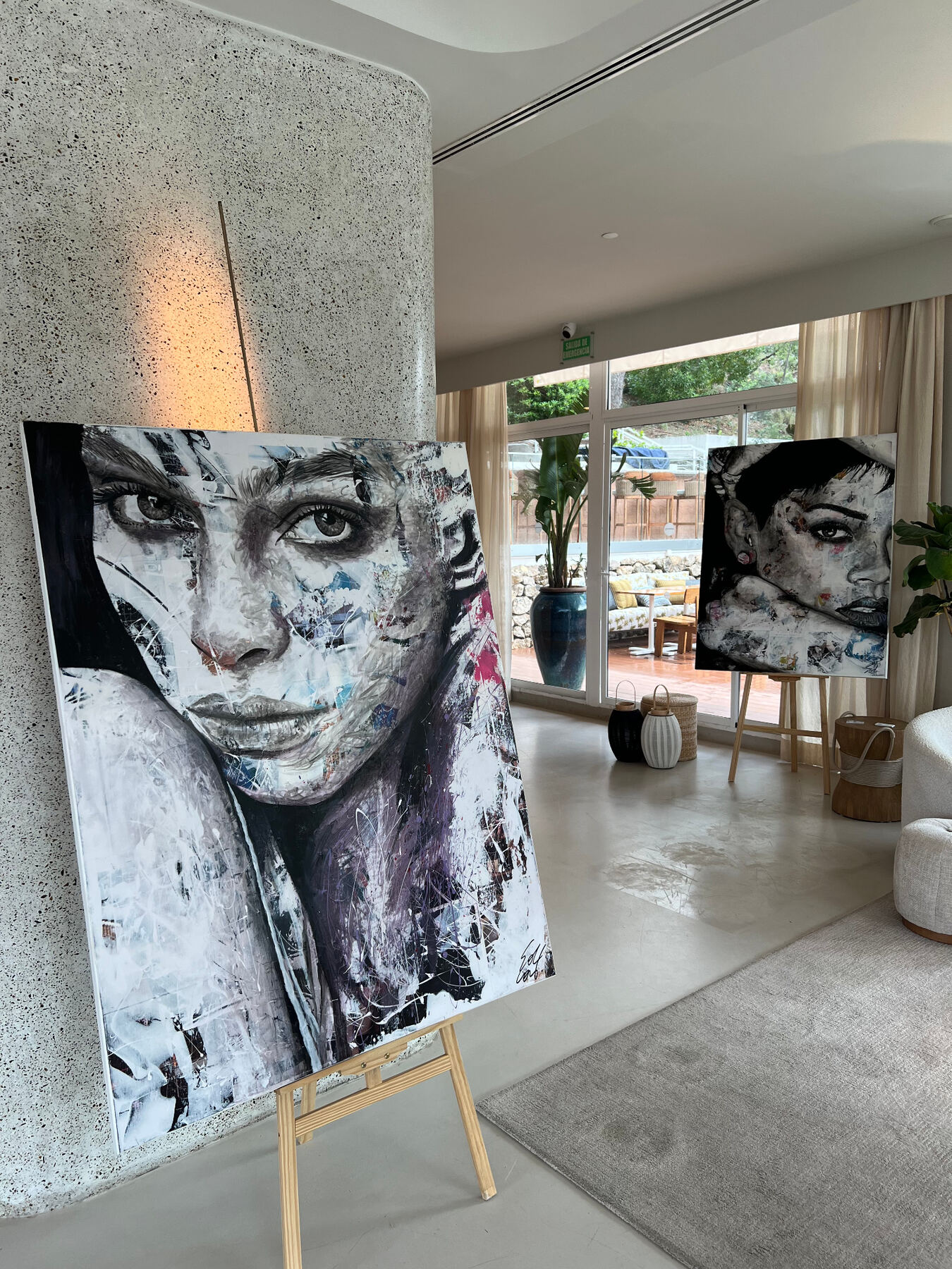 Concrete column meets contemporary canvas.